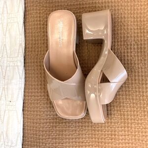 Nude Jeffrey Campbell patent leather block heels.